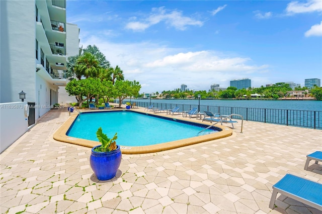 view of swimming pool featuring a patio