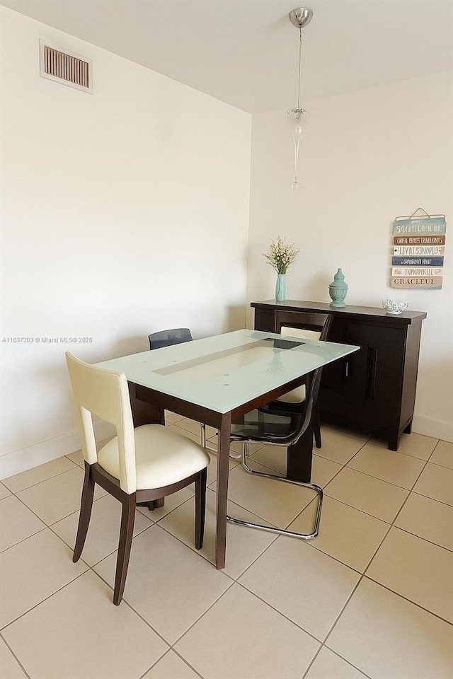 13781 SW 66th St Unit 221B, Miami, FL 33183 - dining space with light tile patterned floors