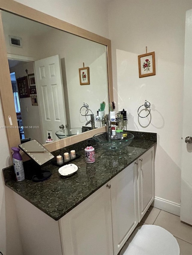 bathroom featuring vanity and tile patterned floors