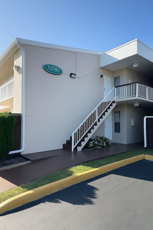 13781 SW 66th St Unit 221B, Miami, FL 33183 - view of property featuring stairs