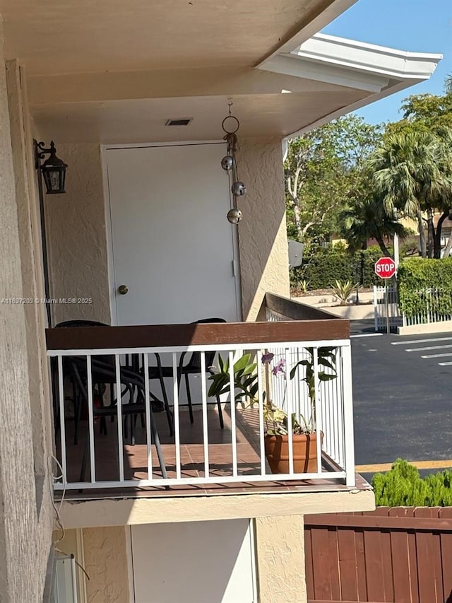 balcony featuring visible vents