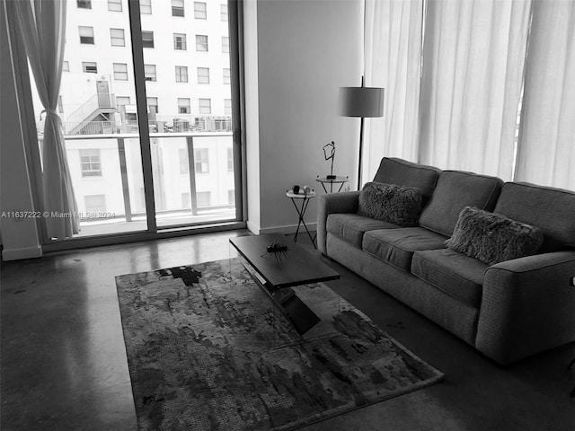 living room featuring concrete floors