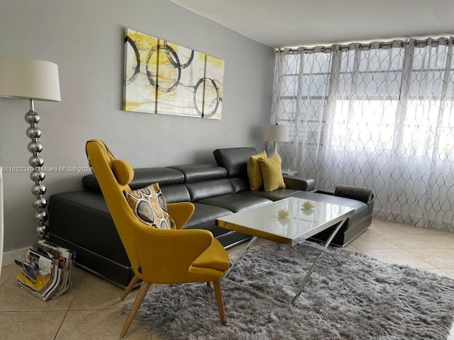 living room with tile patterned flooring