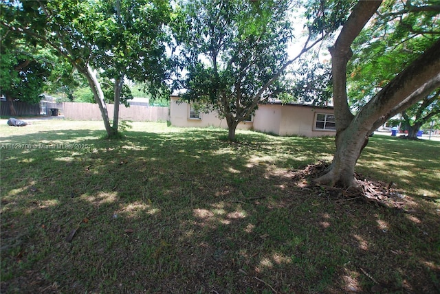 view of yard with fence