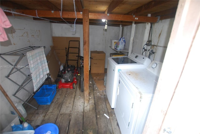1801 NE 176th St, North Miami Beach, FL 33162 - clothes washing area with laundry area, washer and clothes dryer, and hardwood / wood-style flooring
