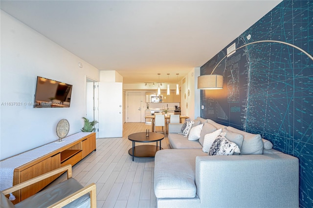 living room with light hardwood / wood-style flooring