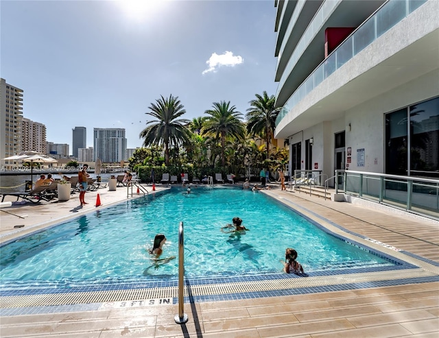 view of swimming pool with a patio area