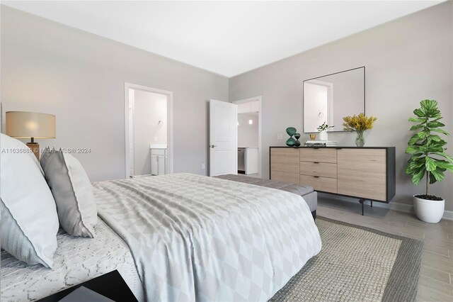 bedroom featuring ensuite bathroom