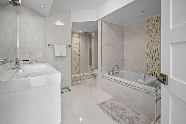 full bathroom featuring vanity, toilet, and shower with separate bathtub