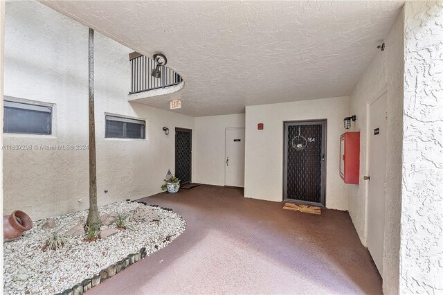 interior space with a balcony