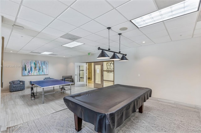 rec room featuring pool table and a drop ceiling