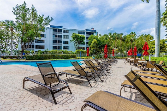 view of swimming pool with a patio area