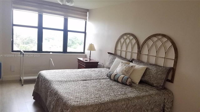 bedroom featuring hardwood / wood-style floors