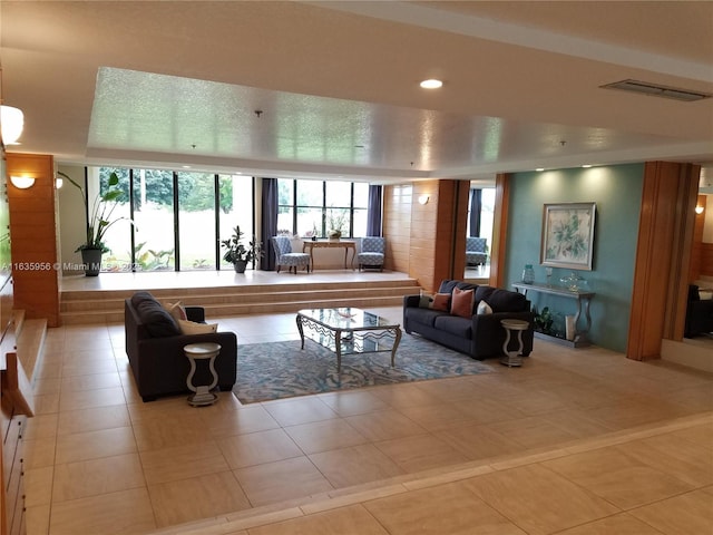 living room with light tile patterned floors