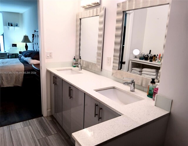 bathroom with dual bowl vanity