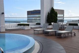 view of patio with a water view