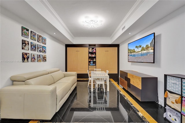 tiled living room featuring a raised ceiling and crown molding