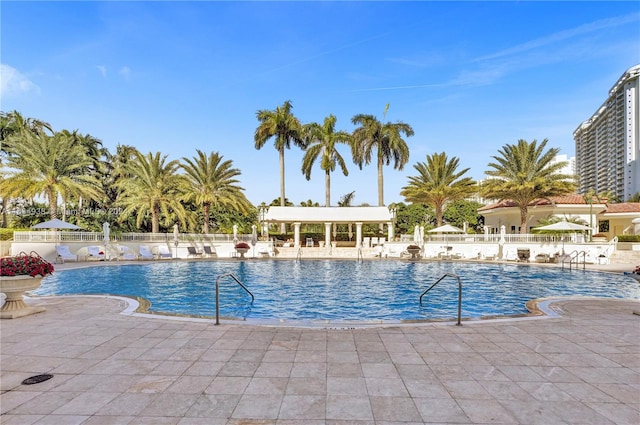 view of swimming pool with a patio area