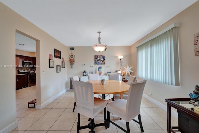 view of tiled dining area