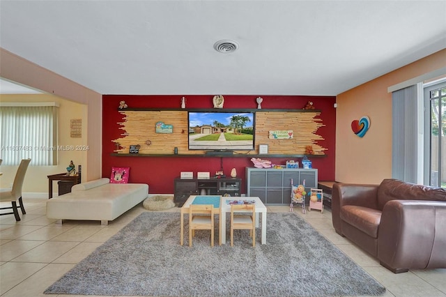 living room with light tile patterned floors