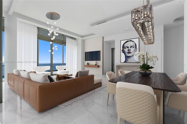 tiled living room featuring a notable chandelier