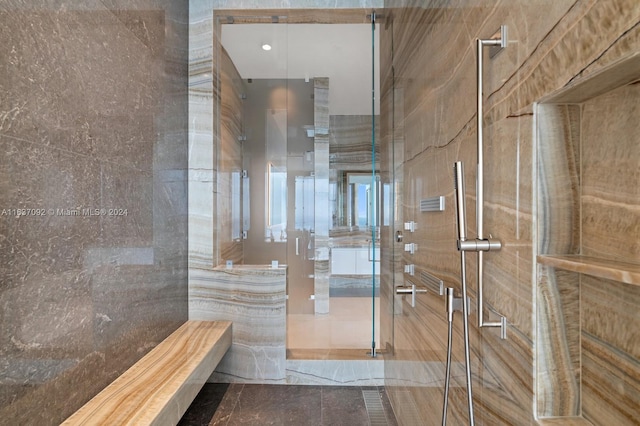 bathroom featuring tile walls and tile patterned floors