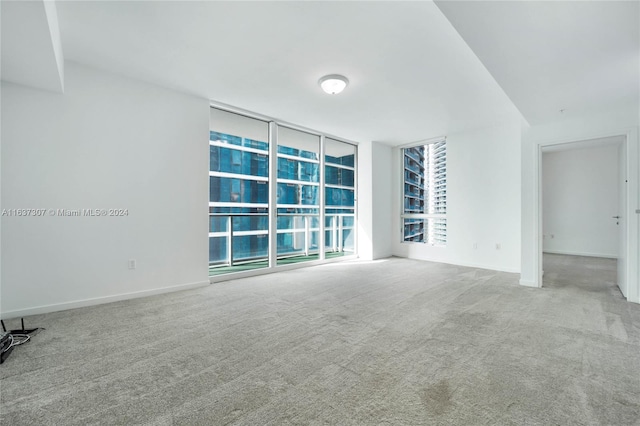 empty room with carpet flooring