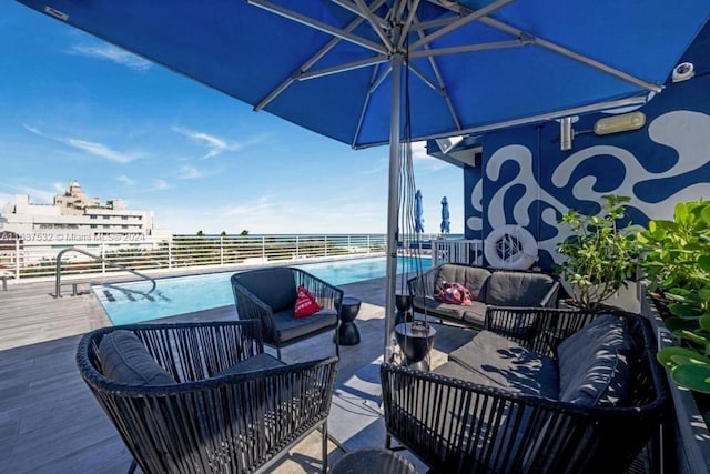 exterior space featuring a community pool and outdoor lounge area