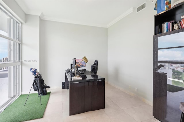 office space with light tile patterned floors, crown molding, and a healthy amount of sunlight