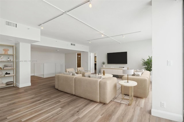 living room featuring light wood-type flooring