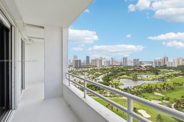 balcony featuring a water view