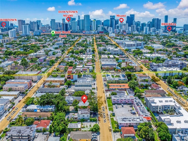 birds eye view of property with a city view