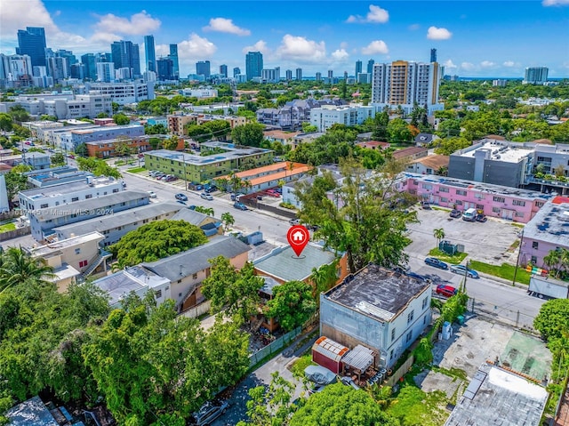 birds eye view of property featuring a view of city