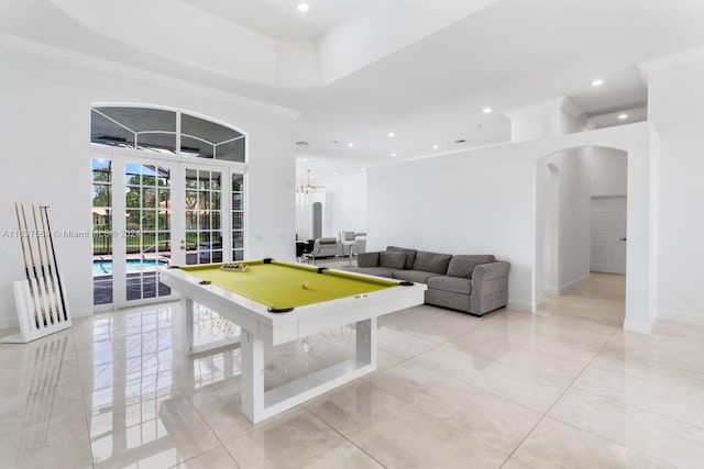 playroom featuring pool table, light tile patterned flooring, french doors, and crown molding