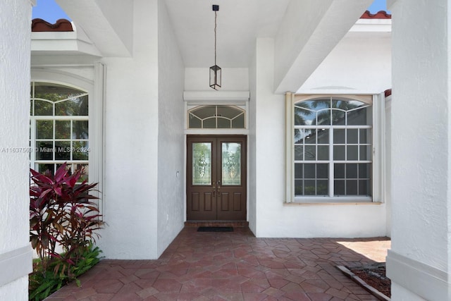 entrance to property featuring french doors