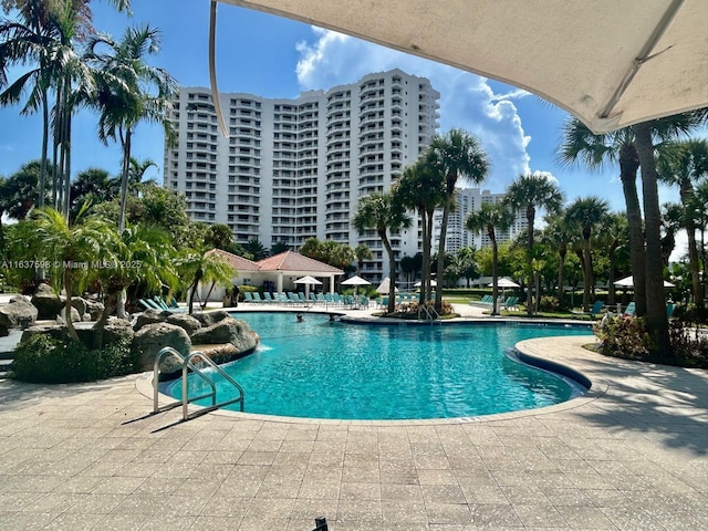 3300 NE 191st St Unit 515, Aventura, FL 33180 - community pool featuring a patio area