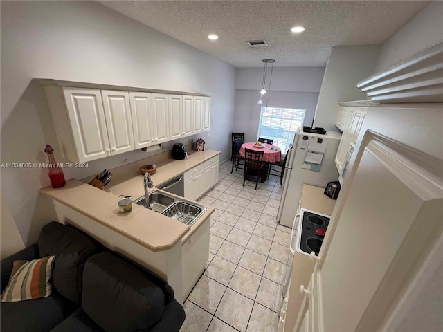home office featuring light tile patterned floors, recessed lighting, a textured ceiling, and a sink