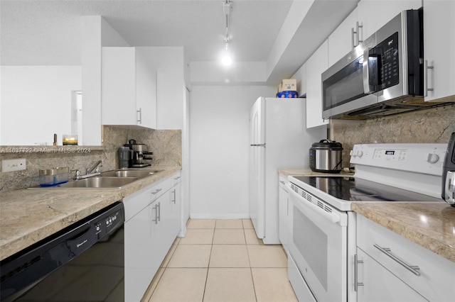 kitchen featuring tasteful backsplash, white electric stove, white cabinetry, light tile patterned floors, and black dishwasher