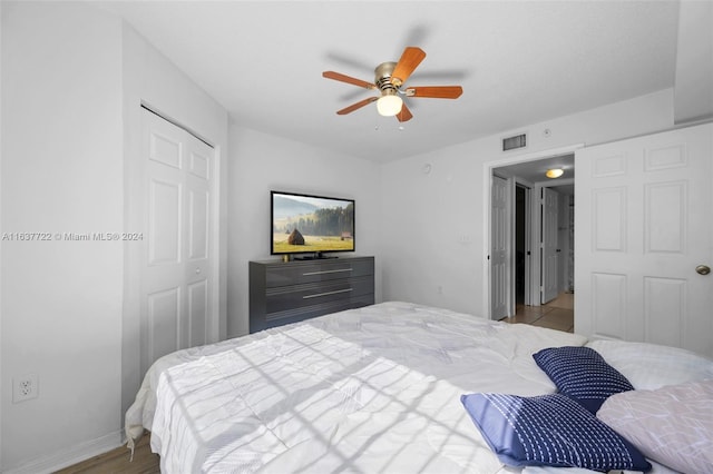 bedroom with a closet and ceiling fan