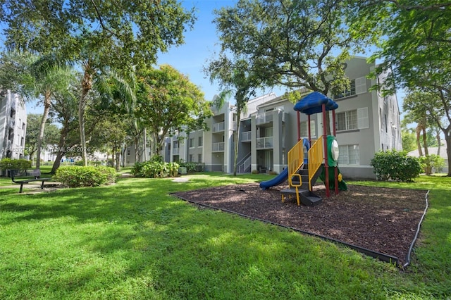 view of playground with a yard