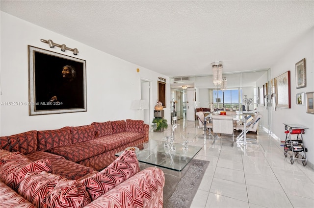 tiled living room with a textured ceiling