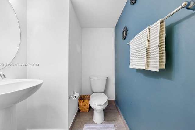 bathroom with sink and toilet