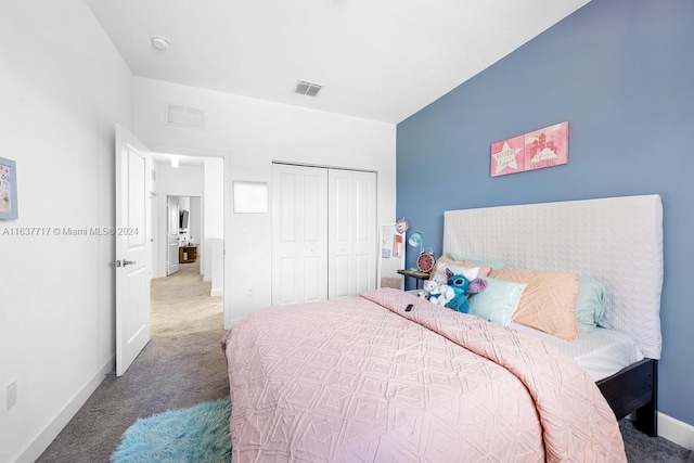 bedroom featuring a closet and carpet floors