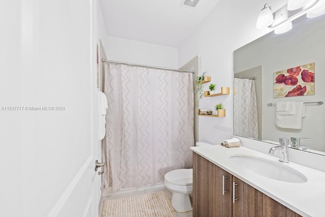 full bathroom with vanity, toilet, tile patterned floors, and shower / tub combo