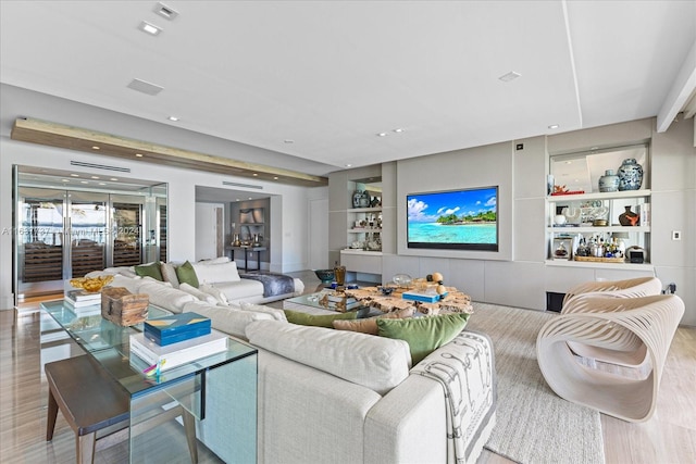 living room with light hardwood / wood-style floors