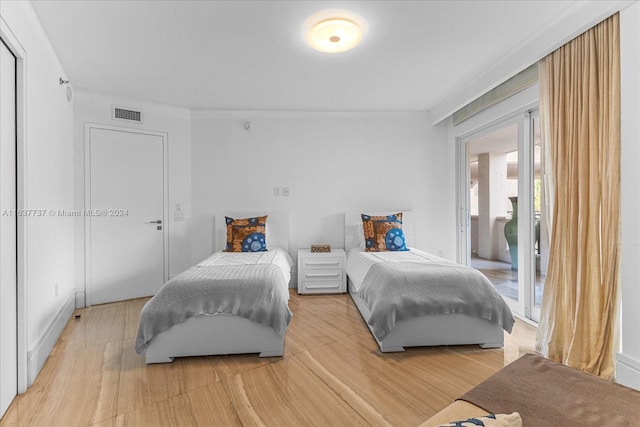 bedroom featuring light wood-type flooring