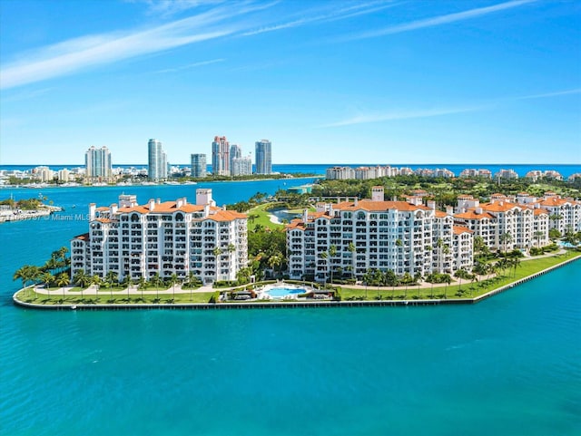 birds eye view of property featuring a water view