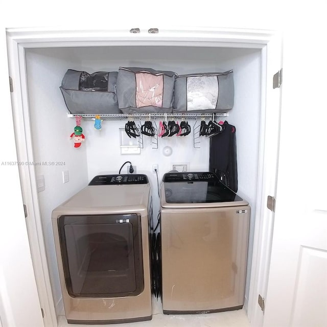 laundry room featuring washer and dryer