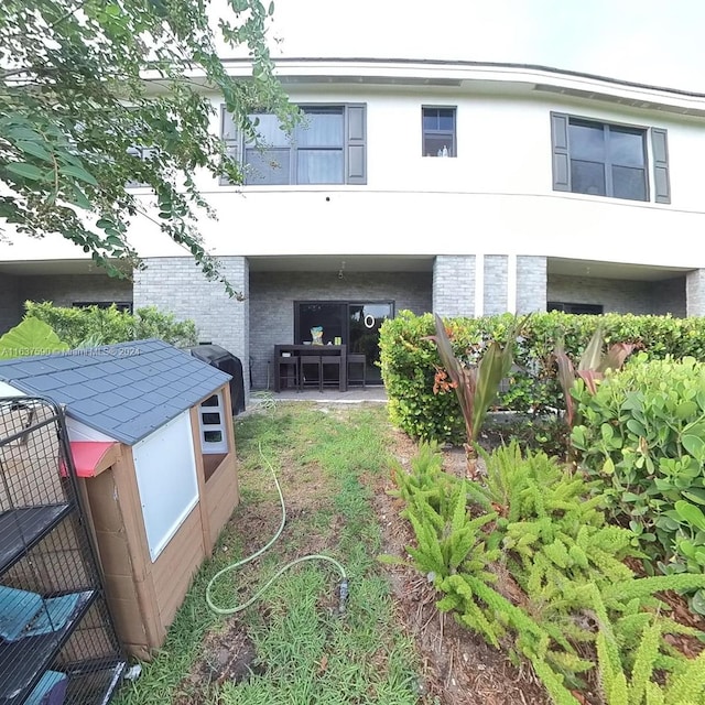 rear view of house with a patio