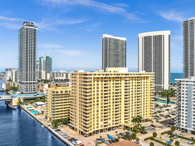 property's view of city with a water view